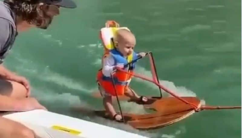 Little Boy Surfs Alone Behind Speedboat Watch Viral Video akb