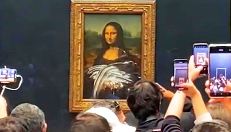 Trending News Cake attack on 'Mona Lisa' at the Louvre in Paris