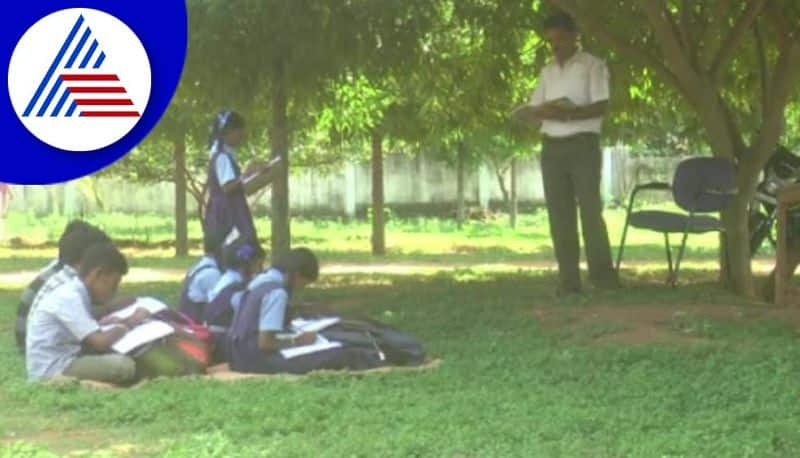 A lesson for children under the tree at chamarajanagar government school gvd