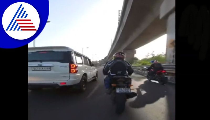 Scorpio driver hits biker speeds off after heated argument in delhi akb