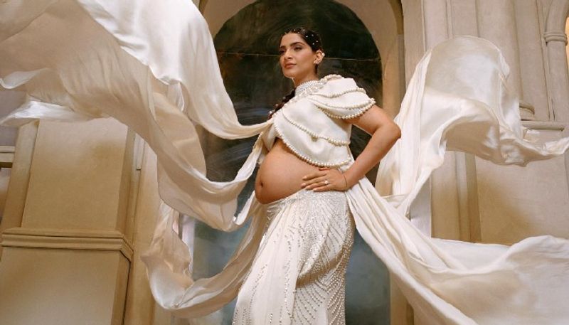 pregnant sonam kapoor in off white satin ensemble 