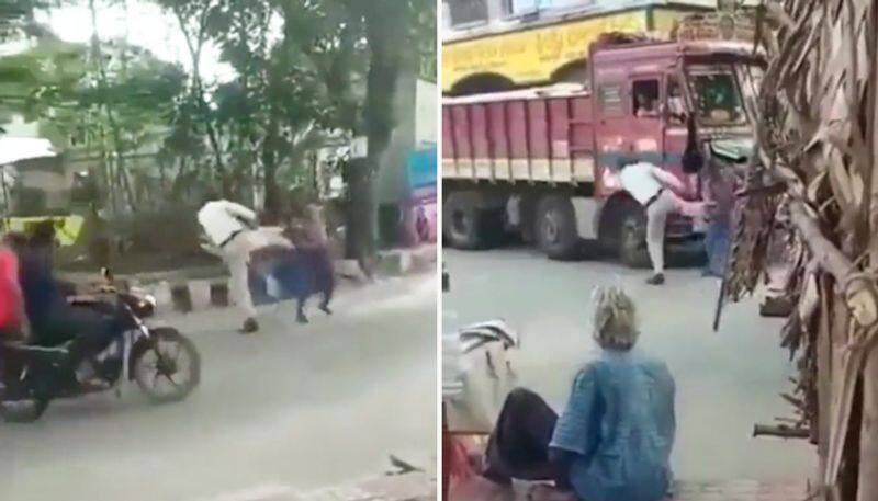 Andhra Pradesh traffic cop thrashes drunk man; gets suspended after video goes viral-tgy