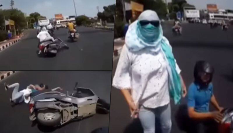 Woman loses balance and falls off; blames biker behind her - gps