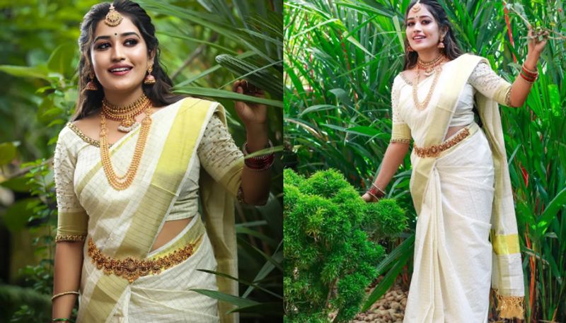 Actress anumol rs shaed super photoshoot pictures in wedding dress