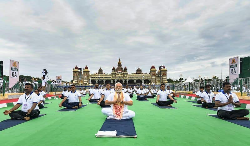 On International Yoga Day Security staff sitting around  Modi in Mysuru gow