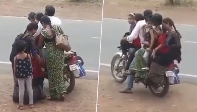 Watch: Man carries 6 people on bike, netizens call it 'family trip' - gps