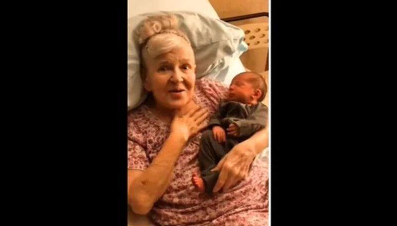 Elderly woman meets great-granddaughter for the first time. Watch