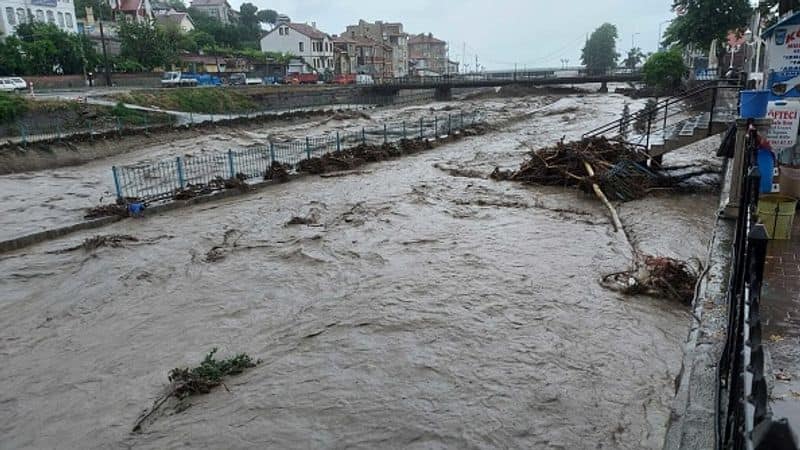 man urges to save from flood water at house In mancherial