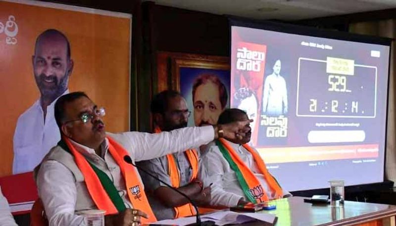 GHMC Fines BJP  Rs.50000 For Installing kCR Countdown Digital Board