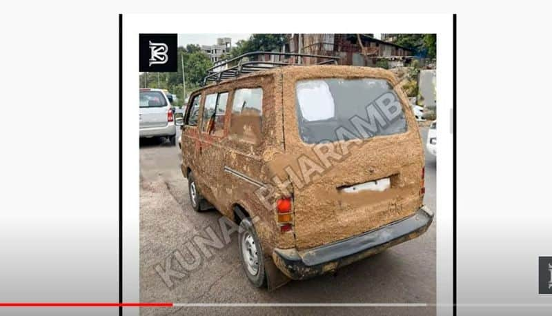 man puts cow dung to car to keep it cool in pune akb