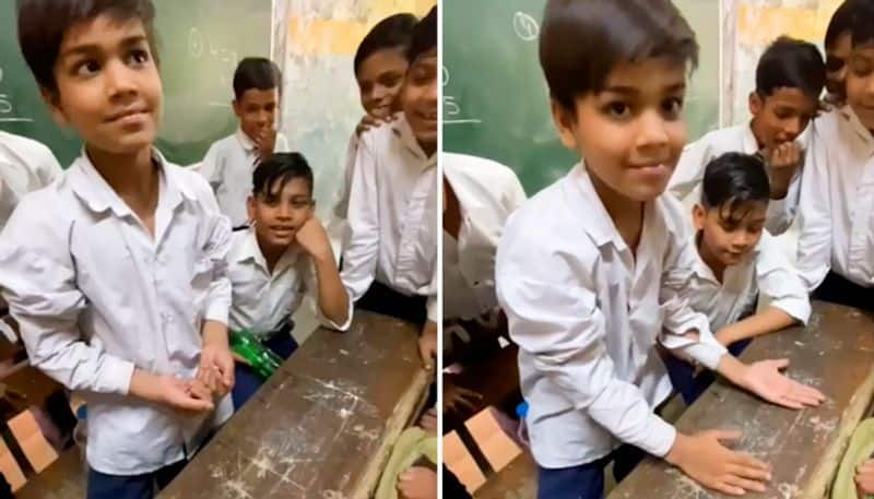 Watch Young school kid performs magic among his friends; video touches 50 million views-tgy