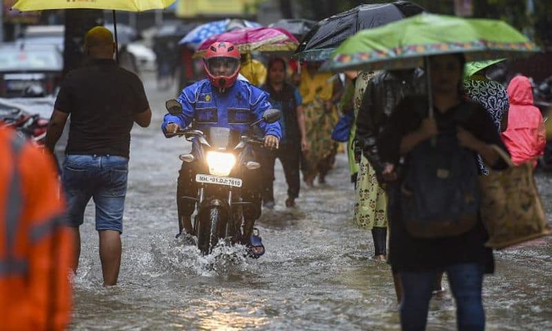 Mumbai Rain Updates Trains cancelled IMD issues red alert for today School holiday 