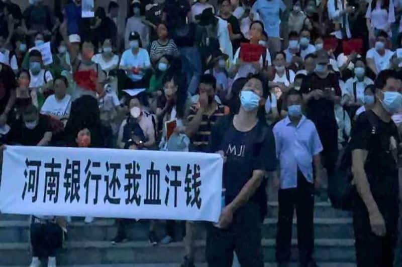 china bank protest: After people protest against banks in china, Officials pledge to release funds