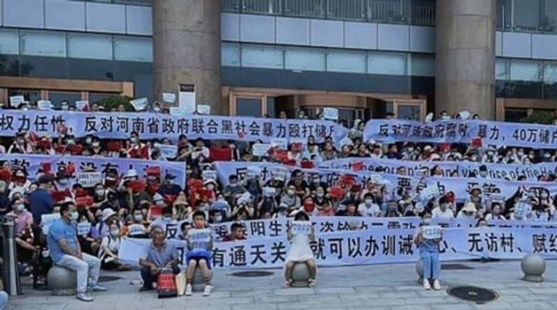 protest economic crisis and frozen millions of dollars worth of deposits in china