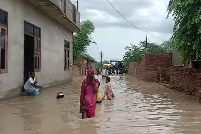 watch viral video of the Mansoon rain and flood akb