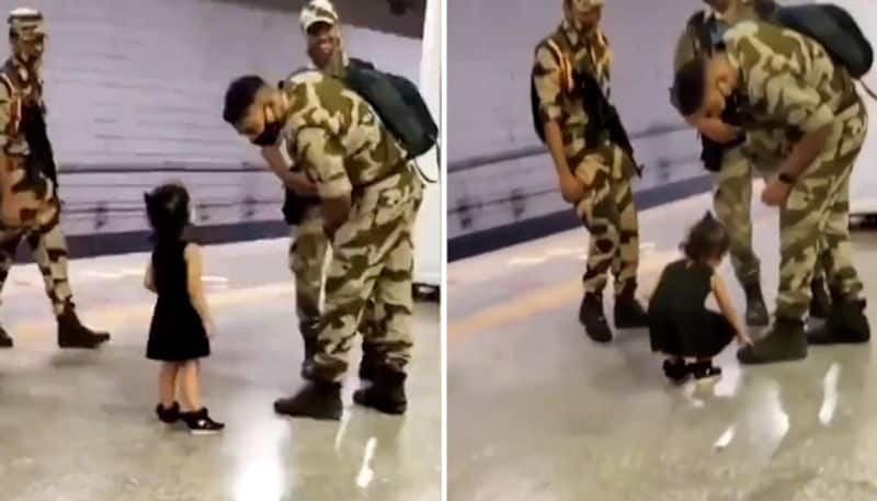 Watch Little girl touches army personnel's feet; wins hearts on the internet-tgy