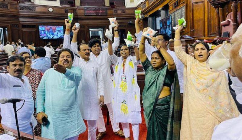 Congress MPs stage protest with curd packets inside Rajya Sabha