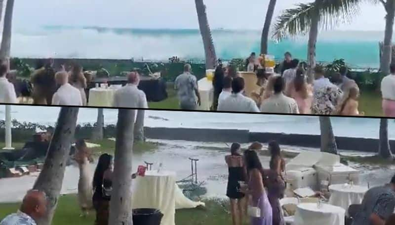 Viral video: Giant waves crash into shore, wedding party disrupted - gps