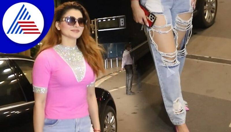 Urvashi Rautela seen wearing torn jeans and shimmer pink top for airport vcs 