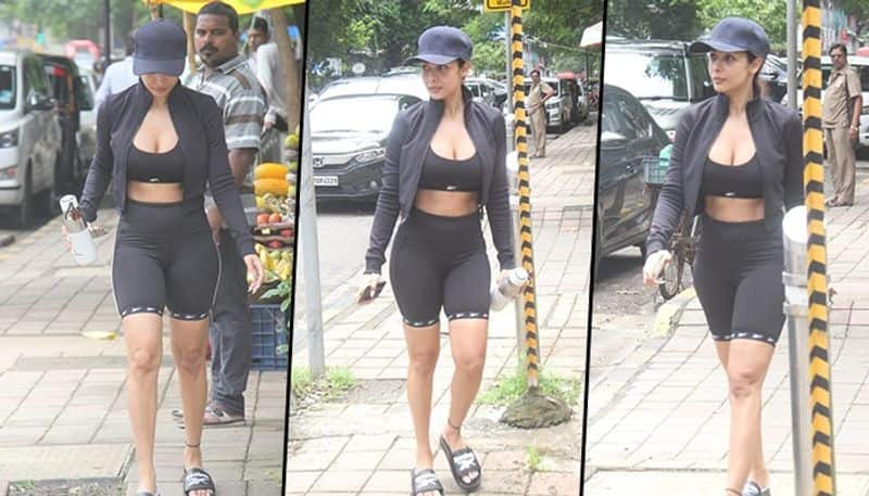 Sexy Pictures: Malaika Arora raises temperature in cleavage-revealing sports bra and biker shorts snt