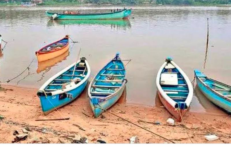 fishermen fishing In Rain And Waves at Udupi rbj