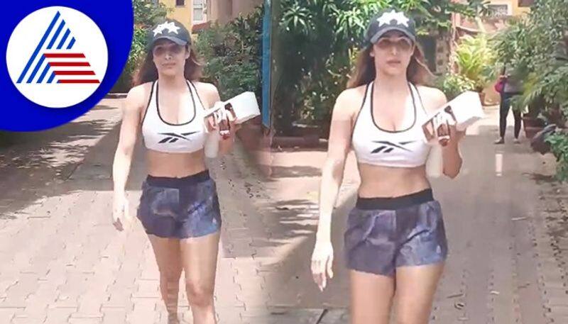 Bollywood Malaika Arora spotted outside yoga class in bandra vcs  