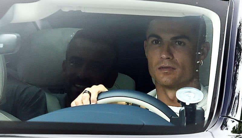 football First Pictures: cristiano Ronaldo at Manchester United Carrington training ground; alex Ferguson joins showdown talks snt