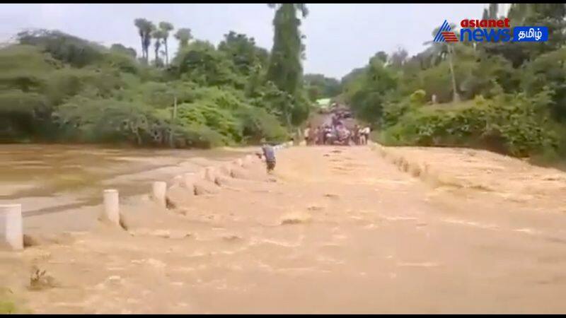 A man washed away while trying to cross a flooded road in Eluru at Andhra Pradesh 