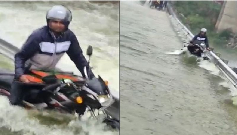 police saved person who was drowning in the flood in hyderabad