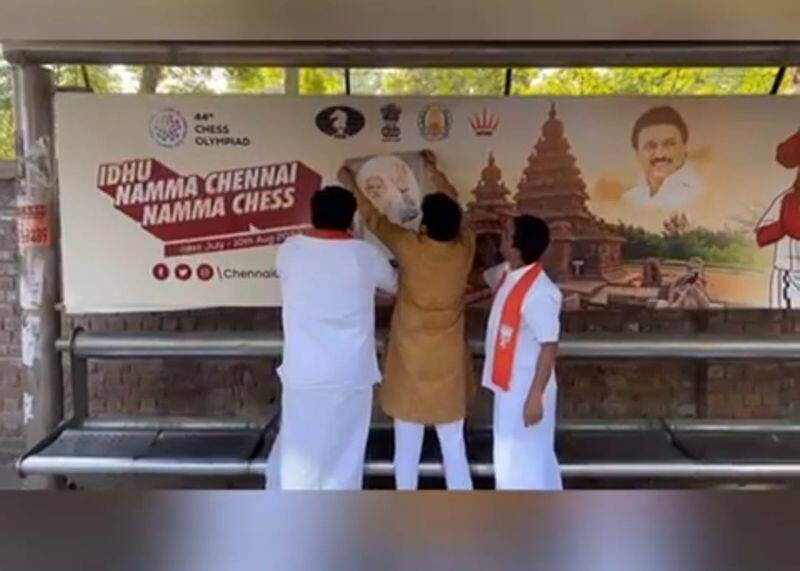 BJP members pasted Modi's picture on chess olympiad poster. 