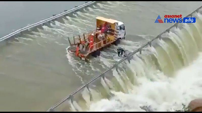 a young man caught in the flood - rescued by the police at Hyderabad