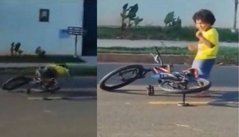 little boy falling from cycle and then started dancing video goes viral