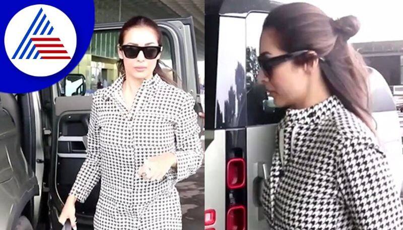 Malaika Arora seen wearing jumpsuit to airport vcs 