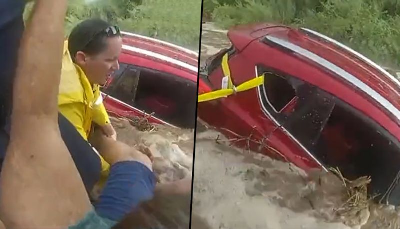 Cops save woman trapped in car amid rising flood waters: watch video - gps