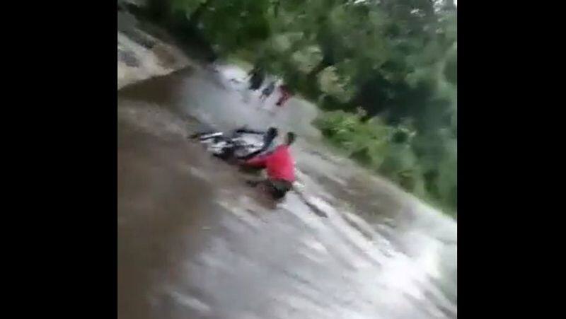  Heavy rains on Javvadu Hill - two wheeler swept away by floods