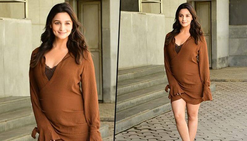 Alia Bhatt looks adorable as she flaunts baby bump in brown dress