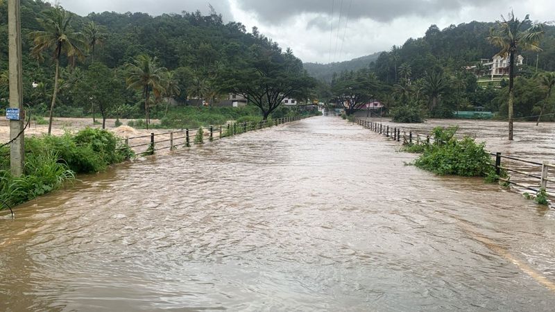 two safely  rescued  inside car stuck in flood water in vikarabad district