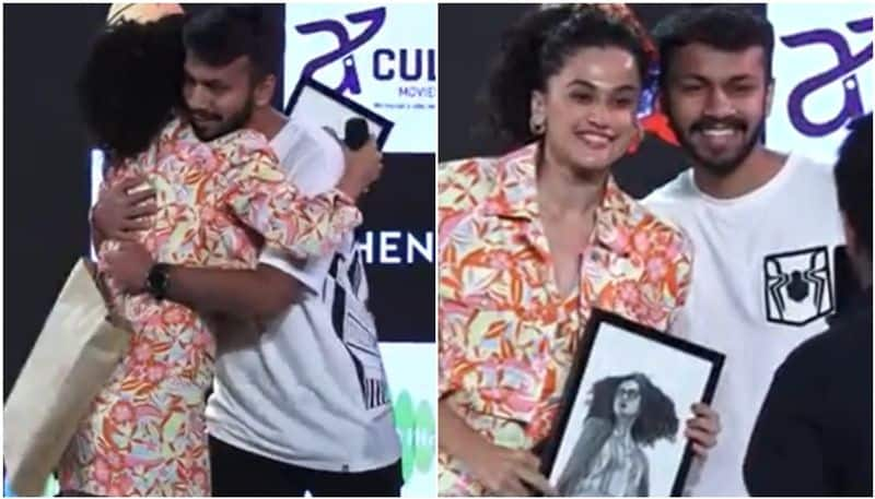 a Fan painting gifts to Actress Taapsee Pannu in Dobaaraa2 Film Promotion sgk