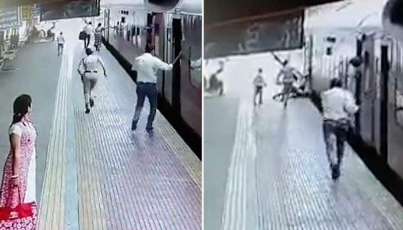 Watch Railway police's quick action saves an older woman and son who slipped while boarding the train-tgy