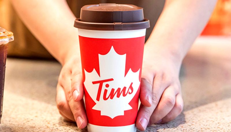 Canada s coffee brand Tim Hortons is set to open its first stores in India