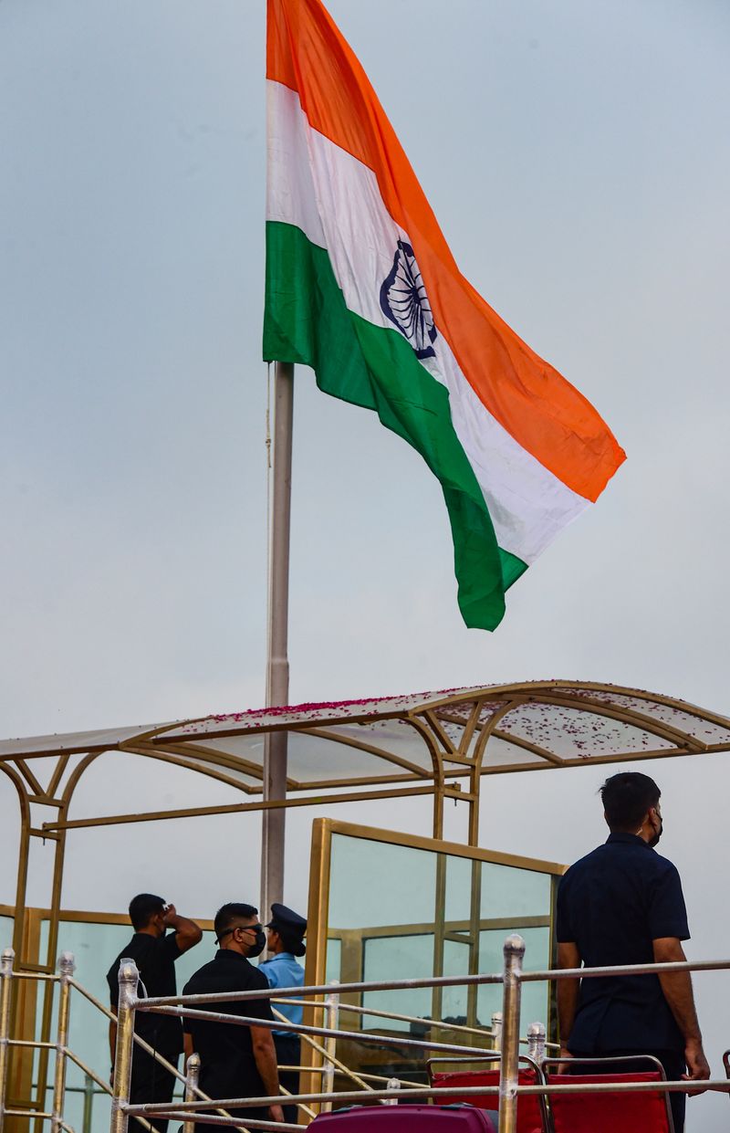 Hoisting of Flags on the Collapsed Houses to Condemn the Government Action in Hubballi grg