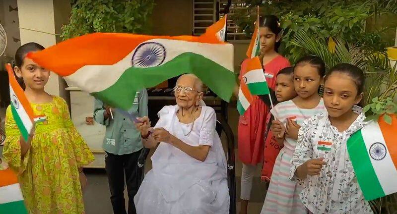 prime minister narendra modi mother joins har ghar tiranga campaign gandhinagar gujarat ash