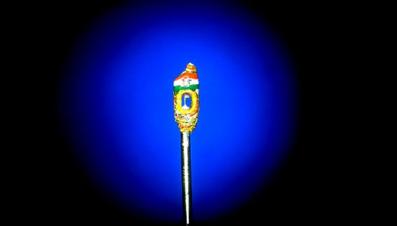 national flag designed on golden grain of rice in jagtial 