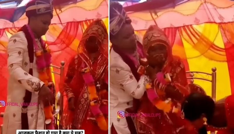 bride slaps groom as he forcefully trying to feed her laddu 