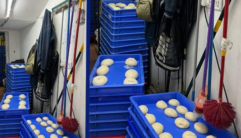 Domino Reaction to Photo of Mop Hanging Over Pizza Dough