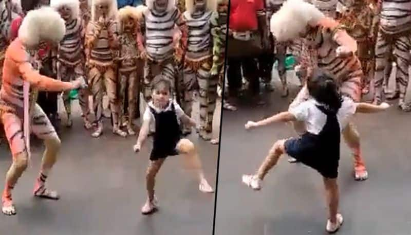 Little girl unites folk dancer during a public performance; heartwarming video goes viral - gps