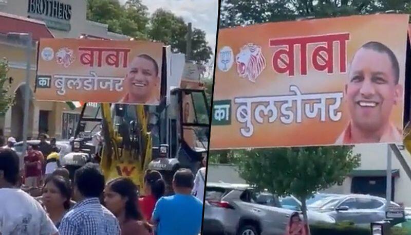 Watch: 'Baba Bulldozer' decorated with pictures of PM Modi, CM Yogi spotted during the rally in New Jersey - gps