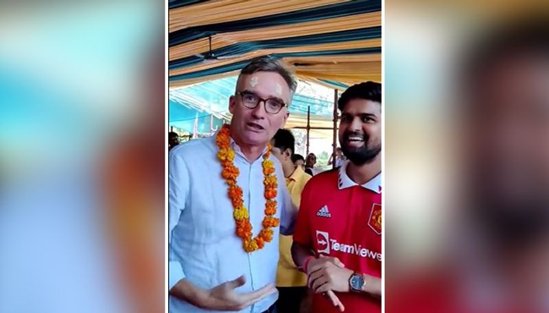 Seeking divine intervention... UK envoy roasts Manchester United supporter at temple in Delhi - adt 