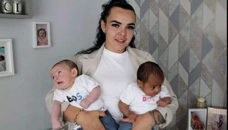 woman gave birth to black and white twins which is very rare