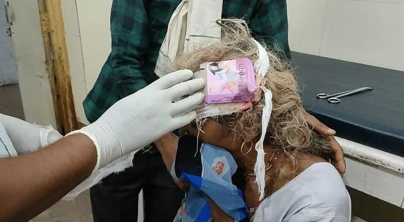 Head Wound Dressed With Condom Pack At Madhya Pradesh Health Centre